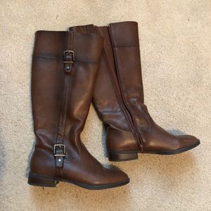 Tall brown riding boots